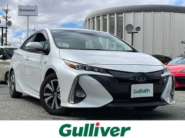 トヨタ プリウス ＰＨＶ A プレミアムナビパッケージ 大阪府 2020(令2)年 5.8万km プラチナホワイトパールマイカ ワンオーナー/純正メモリナビ/・FM/AM/Bluetooth/・フルセグテレビ/全周囲カメラ/バックカメラ/ETC2.0/衝突軽減ブレーキ/レーンキープアシスト/クルーズコントロール/革巻きステアリング/ステアリングリモコン/ハンドルヒーター/シートヒーター（D席+N席）/エアシート（D席+N席）/パワーシート（D席）/ワイヤレス充電器/前後コーナーセンサー/LEDヘッドライト/オートライト/オートエアコン/スマートキー×2/12V電源/USBジャック/純正フロアマット/取扱説明書/ナビ取扱説明書/保証書