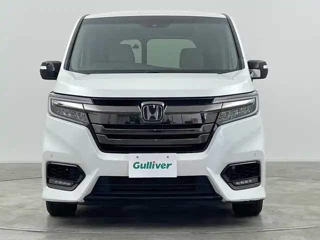 ホンダ ステップワゴン スパーダ ハイブリッドG EX HセンシングBスタイ 神奈川県 2019(平31)年 4.2万km プラチナホワイトパール ホンダセンシング/リアコーナーセンサー/純正９インチナビ/CD/DVD/SD/Bluetooth/フルセグTV/バックカメラ/純正１１．６型フリップダウンモニター/アダプティブクルーズコントロール/DN席シートヒーター/両側パワースライドドア/ステアリングリモコン/オートライト/LEDヘッドライト/LEDフォグライト/電動格納ミラー/ウィンカーミラー/純正AW/ETC/純正ドライブレコーダー（F）/社外ドライブレコーダー（R）/革巻きステアリング/ハーフレザーシート/純正フロアマット/プッシュスタート/スマートキー