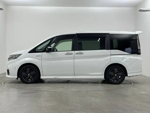 ホンダ ステップワゴン スパーダ ハイブリッドG EX HセンシングBスタイ 神奈川県 2019(平31)年 4.2万km プラチナホワイトパール ホンダセンシング/リアコーナーセンサー/純正９インチナビ/CD/DVD/SD/Bluetooth/フルセグTV/バックカメラ/純正１１．６型フリップダウンモニター/アダプティブクルーズコントロール/DN席シートヒーター/両側パワースライドドア/ステアリングリモコン/オートライト/LEDヘッドライト/LEDフォグライト/電動格納ミラー/ウィンカーミラー/純正AW/ETC/純正ドライブレコーダー（F）/社外ドライブレコーダー（R）/革巻きステアリング/ハーフレザーシート/純正フロアマット/プッシュスタート/スマートキー
