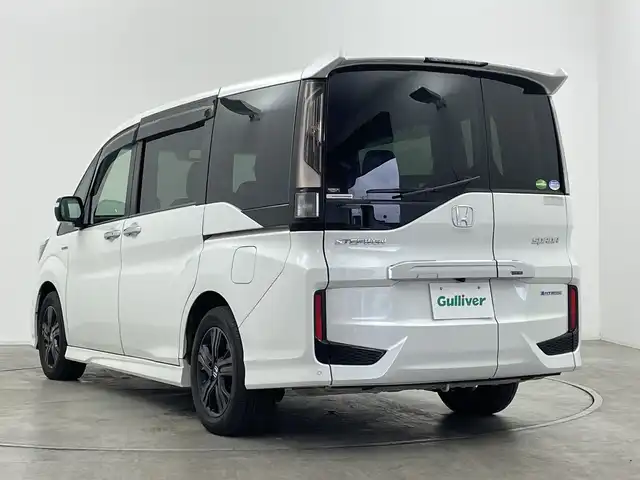 ホンダ ステップワゴン スパーダ ハイブリッドG EX HセンシングBスタイ 神奈川県 2019(平31)年 4.2万km プラチナホワイトパール ホンダセンシング/リアコーナーセンサー/純正９インチナビ/CD/DVD/SD/Bluetooth/フルセグTV/バックカメラ/純正１１．６型フリップダウンモニター/アダプティブクルーズコントロール/DN席シートヒーター/両側パワースライドドア/ステアリングリモコン/オートライト/LEDヘッドライト/LEDフォグライト/電動格納ミラー/ウィンカーミラー/純正AW/ETC/純正ドライブレコーダー（F）/社外ドライブレコーダー（R）/革巻きステアリング/ハーフレザーシート/純正フロアマット/プッシュスタート/スマートキー