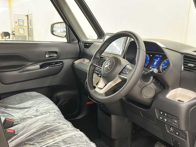 三菱 デリカミニ T プレミアム 道央・札幌 2025(令7)年 0.1万km未満 緑Ｍ /4WD//純正ディスプレイオーディオ/（VTR/HDMI/Android Auto/Apple carplay)//三菱e-Assist/・衝突被害軽減システム/・踏み間違い衝突防止アシスト/・車線逸脱警報システム/・オートマチックハイビーム/・ふらつき警報/・前方衝突予測警報/・標識認識システム/・先行車発進通知/・ヒルディセントコントロール//革巻きステアリング//ステアリングスイッチ//パドルシフト//ハンドルヒーター//両側パワースライドドア//運転席・助手席シートヒーター//ウインカーミラー//デジタルミラー//後席プラズマクラスター付サーキュレーター