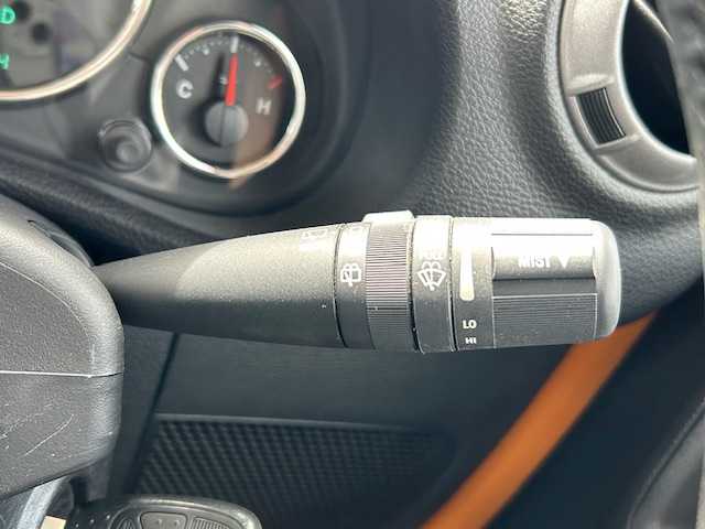 クライスラー・ジープ ジープ ラングラー マウンテン 道東・釧路十勝 2012(平24)年 7.1万km 黄 ４WD/社外SDナビ(AVIC-MRZ09)/CD/DVD/BT/フルセグTV/バックカメラ/左サイドカメラ/クルーズコントロール/革巻きステアリング/ミラーヒーター/ドアバイザー/ドライブレコーダー/ETC/キーレス