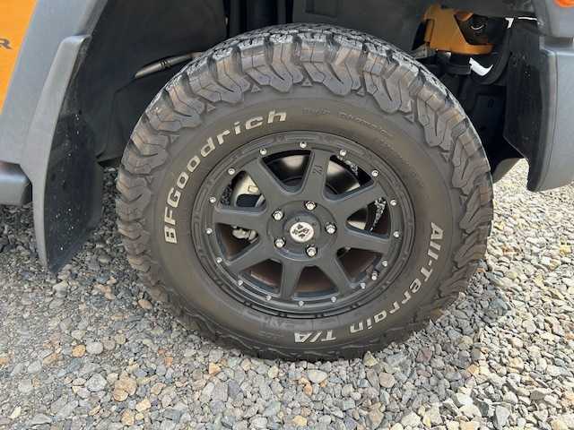 クライスラー・ジープ ジープ ラングラー マウンテン 道東・釧路十勝 2012(平24)年 7.1万km 黄 ４WD/社外SDナビ(AVIC-MRZ09)/CD/DVD/BT/フルセグTV/バックカメラ/左サイドカメラ/クルーズコントロール/革巻きステアリング/ミラーヒーター/ドアバイザー/ドライブレコーダー/ETC/キーレス