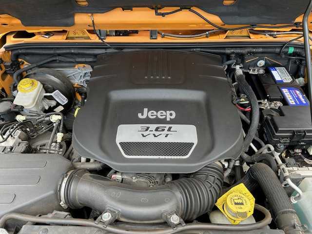 クライスラー・ジープ ジープ ラングラー マウンテン 道東・釧路十勝 2012(平24)年 7.1万km 黄 ４WD/社外SDナビ(AVIC-MRZ09)/CD/DVD/BT/フルセグTV/バックカメラ/左サイドカメラ/クルーズコントロール/革巻きステアリング/ミラーヒーター/ドアバイザー/ドライブレコーダー/ETC/キーレス