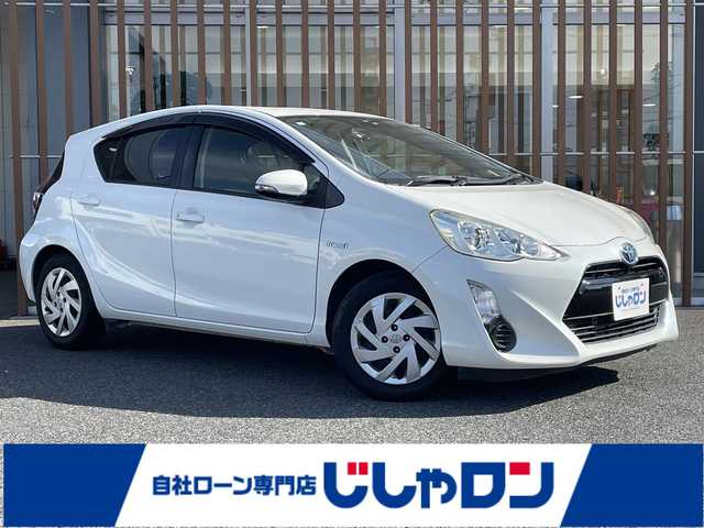 トヨタ アクア S 鳥取県 2015(平27)年 9.5万km ライムホワイトパールクリスタルシャイン (株)IDOMが運営する【じしゃロン鳥取店】の自社ローン専用車両になります。こちらは現金またはオートローンご利用時の価格です。自社ローンご希望の方は別途その旨お申付け下さい/純正SDナビ（W62G）/・フルセグ/CD/DVD/BT/バックカメラ/オートライト/ビルトインETC/スマートキー×2/プッシュスタート