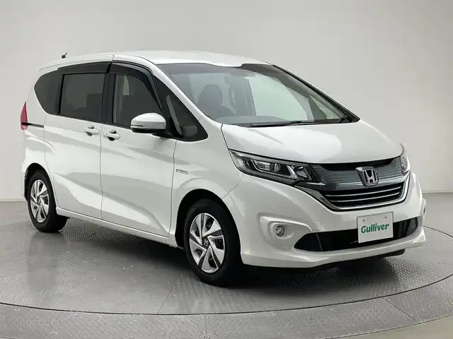 ホンダ フリード ハイブリット G 兵庫県 2018(平30)年 5.1万km ホワイトオーキッドパール 社外メモリナビ（NR-MZ033）/（ワンセグ/CD/DVD/SD/Bluetooth）/バックカメラ/ビルトインETC/片側パワースライドドア/LEDヘッドライト/フォグ/クルーズコントロール/ステアリングスイッチ/社外マット・バイザー/スペアキー