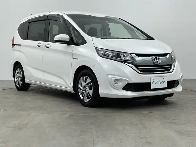 ホンダ フリード ハイブリット G 大分県 2018(平30)年 5.1万km ホワイトオーキッドパール 社外メモリナビ（NR-MZ033）/（ワンセグ/CD/DVD/SD/Bluetooth）/バックカメラ/ビルトインETC/片側パワースライドドア/LEDヘッドライト/フォグ/クルーズコントロール/ステアリングスイッチ/社外マット・バイザー/スペアキー