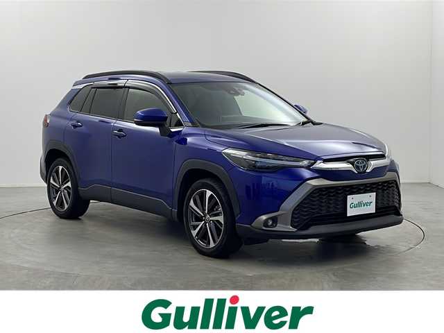 トヨタ カローラ クロス ハイブリッド Z 栃木県 2021(令3)年 2万km ダークブルーマイカM ９型純正ディスプレイオーディオ/　　ナビ/Bluetooth/AM/FM/フルセグTV/バックカメラ/ビルトインETC/トヨタセーフティセンス/・プリクラッシュセーフティ/・レーントレーシングアシスト/・レーンディパーチャーアラート/・ロードサインアシスト/・レーダークルーズコントロール/・オートマチックハイビーム/・先行車発進アラーム/パーキングサポートブレーキ/ブラインド・スポット・モニター/リア・クロス・トラフィック・アラート/純正ドライブレコーダー/パワーバックドア/ハーフレザーシート/運転席パワーシート/前席シートヒーター/純正１８インチAW/純正ドアバイザー/オートライト/LEDヘッドライト/LEDフォグ/電子パーキング/ブレーキホールド/プッシュスタート/スマートキー/スペア１本