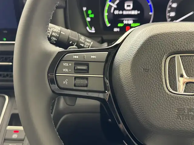 ホンダ ステップワゴン eHEV エアー EX 滋賀県 2025(令7)年 0.1千km プラチナホワイトパール 登録済未使用車/11.4インチ純正メモリーナビ/【Bluetooth/CD/DVD/USB/フルセグ】/バックカメラ/シートヒーター/2列目オットマン/両側パワースライドドア/パワーリアゲート/前後ソナー/ホンダセンシング/追従クルーズコントロール/BSM/電子パーキングブレーキ/オートホールド/LEDヘッドライト/オートハイビーム/MTモード付AT/純正16AW/WAC