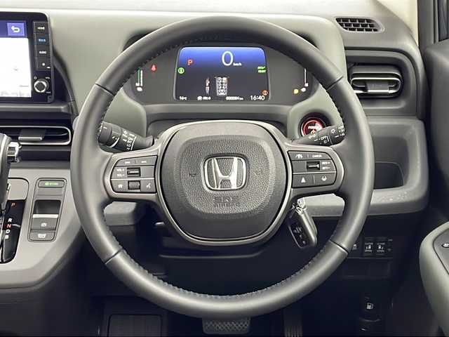 ホンダ フリード ハイブリット e:HEV クロスター 愛知県 2025(令7)年 0.1千km メテオロイドグレーメタリック /R7年10月登録済未使用車//純正HondaCONNECTナビ(LXM-242ZFNI)//フルセグTV・AMFM・Bluetooth・USB//AppleCarPlay・AndroidAuto//バックカメラ//HondaSENSING//前後パーキングセンサー//ブラインドスポットインフォメーション//オートハイビーム//フルLEDヘッドライト//オートライト//フロントフォグランプ//ルーフレール//両側パワースライドドア//後席サンシェード//プライムスムースコンビシート//2列目キャプテンシート//純正15インチアルミホイール//電子パーキングブレーキ//ブレーキホールド//革巻きステアリング//ステアリングスイッチ//プッシュスタート//電動格納ミラー//新車保証書・取扱説明書//スペアキー