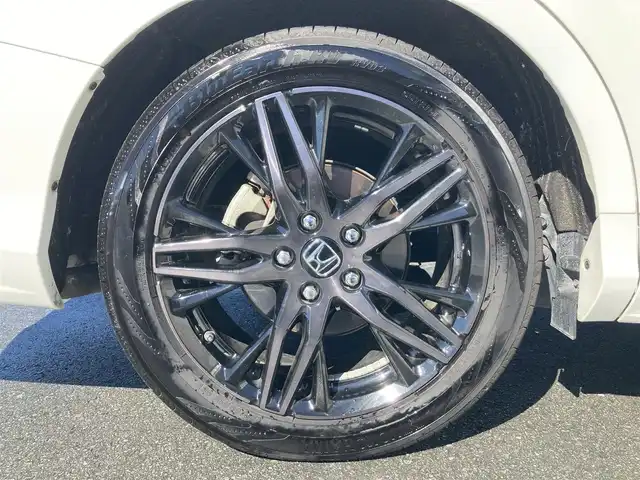 ホンダ オデッセイ ハイブリッド e:HEVアブソルート EX 静岡県 2021(令3)年 10.9万km プラチナホワイトパール Honda　SENSING/純正10インチナビ(VXU-217DYi)/　AM FM CD DVD Bluetooth USB SD AppleCarPlay/フルセグTV/前後方ドライブレコーダー/LEDオートヘッドランプ/レーダークルーズコントロール/シートヒーター(前席)/ハーフレザーシート/パワーバックドア/両側パワースライドドア/前後方クリアランスソナー/純正18インチアルミホイール/100Vソケット/ビルトインETC2.0/アラウンドビューモニター/パワーシート(前席)