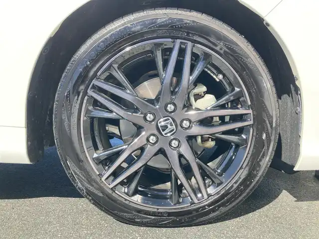 ホンダ オデッセイ ハイブリッド e:HEVアブソルート EX 静岡県 2021(令3)年 10.9万km プラチナホワイトパール Honda　SENSING/純正10インチナビ(VXU-217DYi)/　AM FM CD DVD Bluetooth USB SD AppleCarPlay/フルセグTV/前後方ドライブレコーダー/LEDオートヘッドランプ/レーダークルーズコントロール/シートヒーター(前席)/ハーフレザーシート/パワーバックドア/両側パワースライドドア/前後方クリアランスソナー/純正18インチアルミホイール/100Vソケット/ビルトインETC2.0/アラウンドビューモニター/パワーシート(前席)