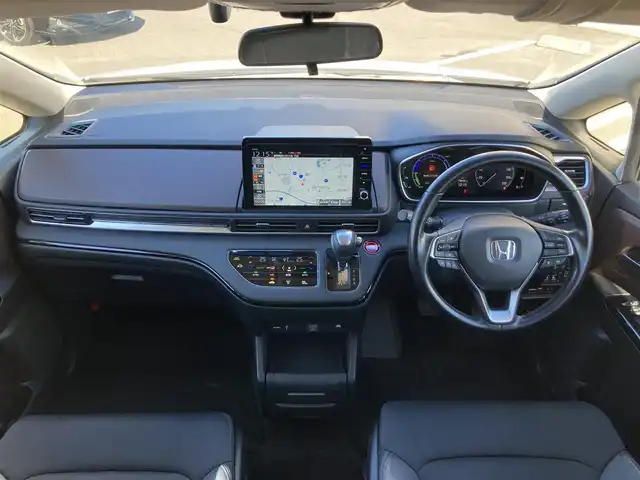 ホンダ オデッセイ ハイブリッド e:HEVアブソルート EX 静岡県 2021(令3)年 10.9万km プラチナホワイトパール Honda　SENSING/純正10インチナビ(VXU-217DYi)/　AM FM CD DVD Bluetooth USB SD AppleCarPlay/フルセグTV/前後方ドライブレコーダー/LEDオートヘッドランプ/レーダークルーズコントロール/シートヒーター(前席)/ハーフレザーシート/パワーバックドア/両側パワースライドドア/前後方クリアランスソナー/純正18インチアルミホイール/100Vソケット/ビルトインETC2.0/アラウンドビューモニター/パワーシート(前席)