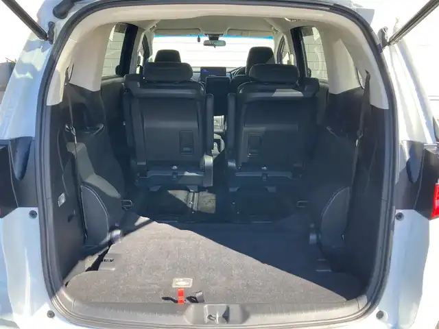 ホンダ オデッセイ ハイブリッド e:HEVアブソルート EX 静岡県 2021(令3)年 10.9万km プラチナホワイトパール Honda　SENSING/純正10インチナビ(VXU-217DYi)/　AM FM CD DVD Bluetooth USB SD AppleCarPlay/フルセグTV/前後方ドライブレコーダー/LEDオートヘッドランプ/レーダークルーズコントロール/シートヒーター(前席)/ハーフレザーシート/パワーバックドア/両側パワースライドドア/前後方クリアランスソナー/純正18インチアルミホイール/100Vソケット/ビルトインETC2.0/アラウンドビューモニター/パワーシート(前席)