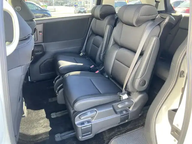 ホンダ オデッセイ ハイブリッド e:HEVアブソルート EX 静岡県 2021(令3)年 10.9万km プラチナホワイトパール Honda　SENSING/純正10インチナビ(VXU-217DYi)/　AM FM CD DVD Bluetooth USB SD AppleCarPlay/フルセグTV/前後方ドライブレコーダー/LEDオートヘッドランプ/レーダークルーズコントロール/シートヒーター(前席)/ハーフレザーシート/パワーバックドア/両側パワースライドドア/前後方クリアランスソナー/純正18インチアルミホイール/100Vソケット/ビルトインETC2.0/アラウンドビューモニター/パワーシート(前席)