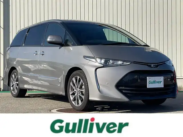 トヨタ エスティマ アエラス プレミアム 富山県 2017(平29)年 10.2万km アイスチタニウムマイカメタリック ワンオーナー/純正フリップダウンモニター/8インチナビ/フルセグＴＶ/Bluetooth/DVD再生/バックカメラ/両側パワースライドドア/クルーズコントロール/オートマチックハイビーム/衝突軽減ブレーキ/レーンディパーチャーアラート/コーナーセンサー/ビルトインETC/パワーシート/7人乗り/LEDオートライト