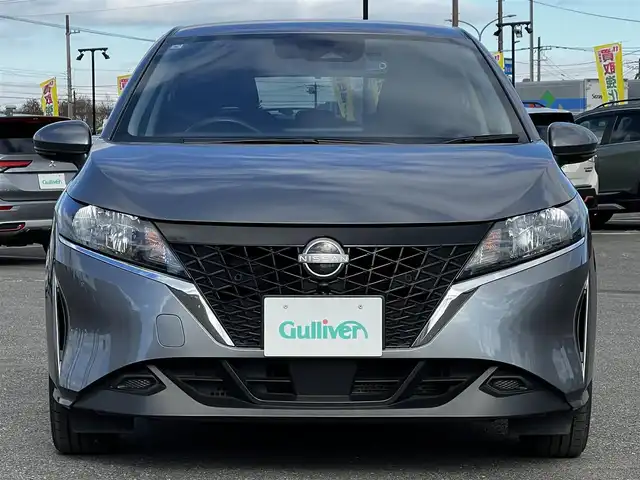 日産 ノート X FOUR 道央・札幌 2023(令5)年 6.9万km ダークメタルグレー ４WD/社外メモリーナビ/AM/FM/BT/衝突被害軽減ブレーキ/横滑り防止装置/クリアランスソナー/バックカメラ/ETC/ドライブレコーダー/アイドリングストップ/EVMODE/前席シートヒーター/革巻きステアリング/ステアリングリモコン/ハンドルヒーター/電動パーキング/オートブレーキホールド/プッシュスタート/スマートキー/ハロゲンヘッドライト/オートライト/ヘッドライトレベライザー/電動格納ミラー/ウィンカーミラー/社外フロアマット/スペアキー