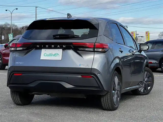 日産 ノート X FOUR 道央・札幌 2023(令5)年 6.9万km ダークメタルグレー ４WD/社外メモリーナビ/AM/FM/BT/衝突被害軽減ブレーキ/横滑り防止装置/クリアランスソナー/バックカメラ/ETC/ドライブレコーダー/アイドリングストップ/EVMODE/前席シートヒーター/革巻きステアリング/ステアリングリモコン/ハンドルヒーター/電動パーキング/オートブレーキホールド/プッシュスタート/スマートキー/ハロゲンヘッドライト/オートライト/ヘッドライトレベライザー/電動格納ミラー/ウィンカーミラー/社外フロアマット/スペアキー