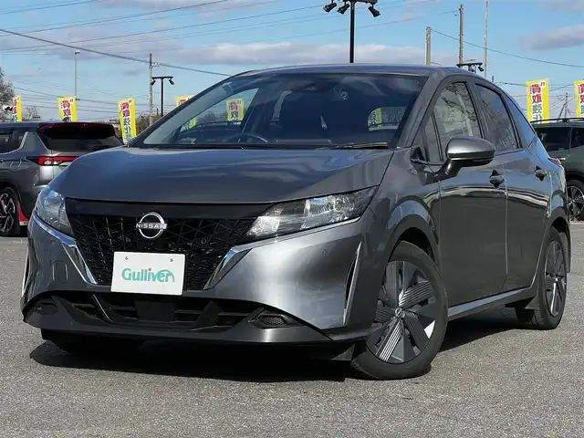 日産 ノート X FOUR 道央・札幌 2023(令5)年 6.9万km ダークメタルグレー ４WD/社外メモリーナビ/AM/FM/BT/衝突被害軽減ブレーキ/横滑り防止装置/クリアランスソナー/バックカメラ/ETC/ドライブレコーダー/アイドリングストップ/EVMODE/前席シートヒーター/革巻きステアリング/ステアリングリモコン/ハンドルヒーター/電動パーキング/オートブレーキホールド/プッシュスタート/スマートキー/ハロゲンヘッドライト/オートライト/ヘッドライトレベライザー/電動格納ミラー/ウィンカーミラー/社外フロアマット/スペアキー