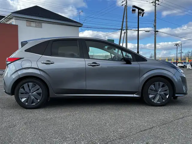 日産 ノート X FOUR 道央・札幌 2023(令5)年 6.9万km ダークメタルグレー ４WD/社外メモリーナビ/AM/FM/BT/衝突被害軽減ブレーキ/横滑り防止装置/クリアランスソナー/バックカメラ/ETC/ドライブレコーダー/アイドリングストップ/EVMODE/前席シートヒーター/革巻きステアリング/ステアリングリモコン/ハンドルヒーター/電動パーキング/オートブレーキホールド/プッシュスタート/スマートキー/ハロゲンヘッドライト/オートライト/ヘッドライトレベライザー/電動格納ミラー/ウィンカーミラー/社外フロアマット/スペアキー