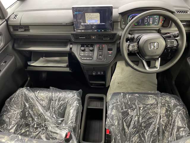 ホンダ ステップワゴン スパーダ eHEV 熊本県 2025(令7)年 0.1千km クリスタルブラックパール 純正11.4インチナビHonda CONNECTナビ（LXM-247VFLi）/・AM/FM/CD/DVD/SD/BT/USB/フルセグTV/バックカメラ/ホンダセンシング/・衝突軽減ブレーキ/・路外逸脱抑制機能/・アダプティブクルーズコントロール/・ブラインドスポットモニター/パドルシフト/電動パーキングブレーキ/ブレーキホールド/ECON/横滑り防止装置/両側パワースライドドア/電動リアゲート/前後コーナーセンサー/オットマン/LEDヘッドライト/オートライト/フォグランプ/ヘッドライトレベライザー/純正16インチアルミホイール/スマートキー/スペアキー/プッシュスタート/ワンオーナー