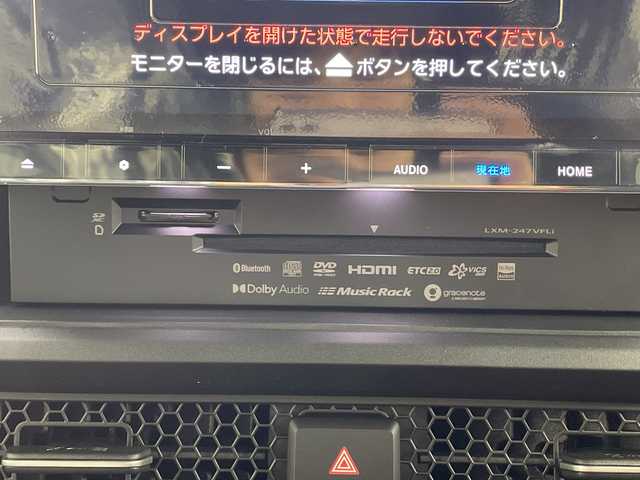 ホンダ ステップワゴン スパーダ eHEV 熊本県 2025(令7)年 0.1千km クリスタルブラックパール 純正11.4インチナビHonda CONNECTナビ（LXM-247VFLi）/・AM/FM/CD/DVD/SD/BT/USB/フルセグTV/バックカメラ/ホンダセンシング/・衝突軽減ブレーキ/・路外逸脱抑制機能/・アダプティブクルーズコントロール/・ブラインドスポットモニター/パドルシフト/電動パーキングブレーキ/ブレーキホールド/ECON/横滑り防止装置/両側パワースライドドア/電動リアゲート/前後コーナーセンサー/オットマン/LEDヘッドライト/オートライト/フォグランプ/ヘッドライトレベライザー/純正16インチアルミホイール/スマートキー/スペアキー/プッシュスタート/ワンオーナー