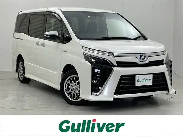 トヨタ ヴォクシー ハイブリッド ZS 煌Ⅱ 茨城県 2020(令2)年 3.9万km ホワイトパールクリスタルシャイン 純正10インチナビ/CD/DVD/フルセグ/Bluetoothオーディオ/バックカメラ/クルーズコントロール/ビルトインETC/両側パワースライドドア/スマートキー/プッシュスタート/オートライト/D＋N席シートヒーター/前後ドライブレコーダー/LEDヘッドライト/純正１６インチアルミホイール