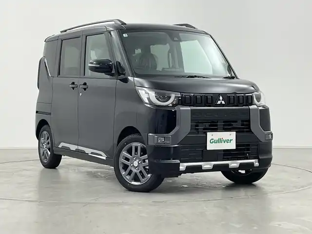 三菱 デリカミニ T プレミアム 群馬県 2025(令7)年 0.1万km未満 アメジストブラック 届出済未使用車　純正９型ディスプレイオーディオ　全周囲カメラ　電子ミラー　サイドデカール　マイパイロット　両側電動スライドドア　ハーフレザーシート　シートヒーター　ハンドルヒーター　ＬＥＤ　禁煙