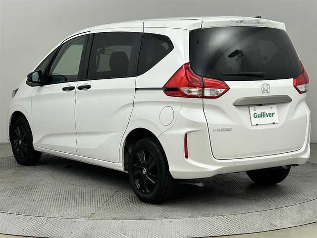 ホンダ フリード G ブラックスタイル 道央・札幌 2024(令6)年 1.4万km プラチナホワイトパール ・4WD/・衝突被害軽減ブレーキ/・レーンキープアシスト/・レーダークルーズコントロール/・コーナーセンサー/・社外ナビ/・バックカメラ/・Bluetooth/・両側パワースライドドア/・シートヒーター/・スマートキー/・プッシュスタート/・オートライト