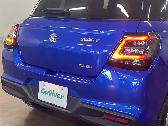 スズキ スイフト HYBRID MX 道央・札幌 2024(令6)年 2万km 青Ｍ ワンオーナー/4WD/衝突軽減ブレーキ/レーンキープアシスト/横滑り防止/アイドリングストップ/レーダークルーズコントロール/ブラインドスポットモニター/プッシュスタート/スマートキー×2/純正エンジンスターター/社外オーディオ/CD/Bluetooth/AUX/USB/AM/FM/シートヒーター（D/N）/ミラーヒーター/オートライト/純正フロアマット/純正ドアバイザー/LEDヘッドライト/フォグランプ/純正16インチAW/保証書/取扱説明書