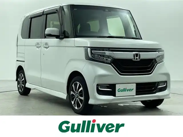 ホンダ Ｎ ＢＯＸ カスタム G L ホンダセンシング 福島県 2020(令2)年 2.9万km プラチナホワイトパール ４WD/純正9インチナビ/【AM/FM/CD/Bluetooth/フルセグTV/USB】/バックカメラ/ETC/片側パワースライドドア/ホンダセンシング/・衝突軽減ブレーキ/・クルーズコントロール（追従有）/・車線逸脱警報機能/・レーンキープアシスト/シートヒーター/プッシュスタート/スマートキー/スペアキー/オートライト/LEDヘッドライド