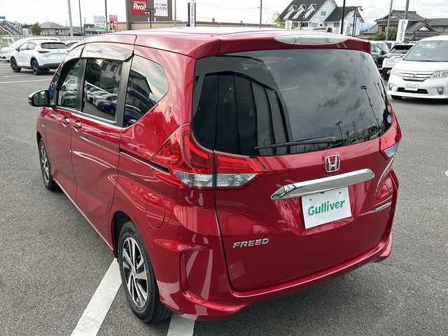 ホンダ フリード ハイブリット EX 岐阜県 2019(平31)年 5.7万km プレミアムクリスタルレッドM 登録時走行距離：56253km/９インチナビ/バックカメラ/フルセグテレビ・Bluetooth・CD・DVD・HDMI・USB/両側パワースライドドア/レーンキープアシスト/ETC/ハーフレザーシート/前席シートヒーター/ドライブレコーダー/ウォークスルー/オートライト/純正15インチアルミホイール/プッシュスタート/スマートキー/スペアキー/LEDヘッドライト/オートライト