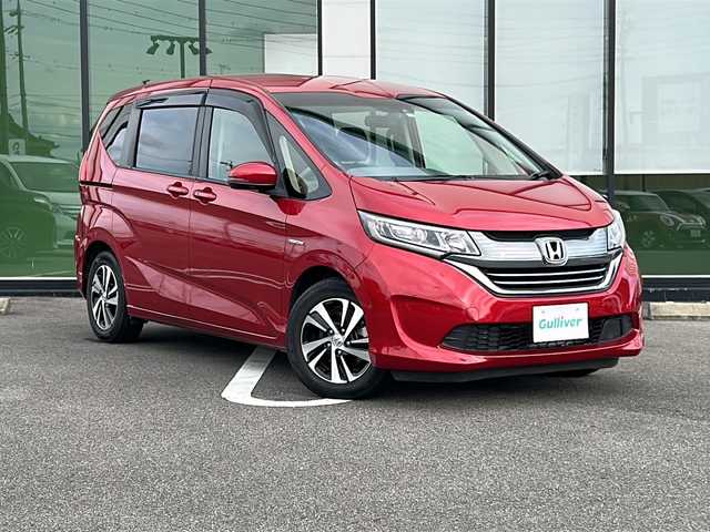 ホンダ フリード ハイブリット EX 岐阜県 2019(平31)年 5.7万km プレミアムクリスタルレッドM 登録時走行距離：56253km/９インチナビ/バックカメラ/フルセグテレビ・Bluetooth・CD・DVD・HDMI・USB/両側パワースライドドア/レーンキープアシスト/ETC/ハーフレザーシート/前席シートヒーター/ドライブレコーダー/ウォークスルー/オートライト/純正15インチアルミホイール/プッシュスタート/スマートキー/スペアキー/LEDヘッドライト/オートライト