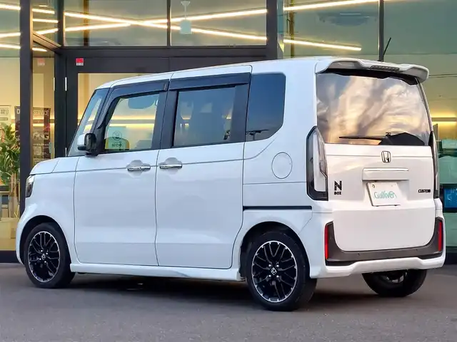 ホンダ Ｎ ＢＯＸ カスタム ターボ コーディネートS 東京都 2023(令5)年 2.6万km プラチナホワイトパール ワンオーナー/Honda SENSING/・衝突軽減ブレーキ/・誤発進抑制機能/・路外逸脱抑制機能/・アダプティブクルーズコントロール/・コーナーセンサー/プッシュスタート/パドルシフト/社外ナビ/フルセグTV/バックカメラ/ETC/ベンチシート/両側パワースライドドア/シートヒーター/シートバックテーブル/後席ロールサンシェード/LEDヘッドライト/オートライト/ドアバイザー/15インチ純正アルミホイール/スマートキー