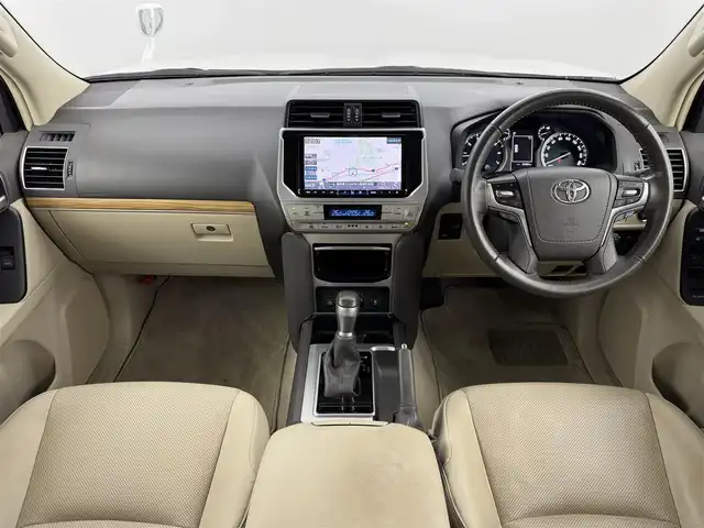 トヨタ ランドクルーザー プラド TX Lパッケージ 福岡県 2022(令4)年 3.4万km ホワイトパールクリスタルシャイン ムーンルーフ/７人乗り　/アルパインナビ／フルセグＴＶ　/バックカメラ　/ＥＴＣ　/ドラレコ　/トヨタセーフティセンス　/アクセル踏み間違い防止　/シートベンチレーション／ヒーター　/パワーシート　/純正１９インチＡＷ
