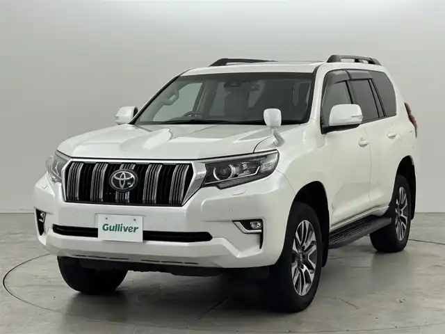 トヨタ ランドクルーザー プラド TX Lパッケージ 福岡県 2022(令4)年 3.4万km ホワイトパールクリスタルシャイン ムーンルーフ/７人乗り　/アルパインナビ／フルセグＴＶ　/バックカメラ　/ＥＴＣ　/ドラレコ　/トヨタセーフティセンス　/アクセル踏み間違い防止　/シートベンチレーション／ヒーター　/パワーシート　/純正１９インチＡＷ