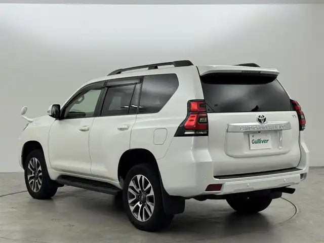 トヨタ ランドクルーザー プラド TX Lパッケージ 福岡県 2022(令4)年 3.4万km ホワイトパールクリスタルシャイン ムーンルーフ/７人乗り　/アルパインナビ／フルセグＴＶ　/バックカメラ　/ＥＴＣ　/ドラレコ　/トヨタセーフティセンス　/アクセル踏み間違い防止　/シートベンチレーション／ヒーター　/パワーシート　/純正１９インチＡＷ