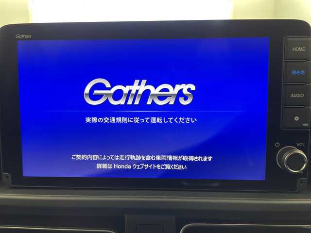 ホンダ フリード ハイブリット e:HEV クロスター 岐阜県 2025(令7)年 0.1千km メテオロイドグレーメタリック 純正9インチナビ/フルセグ/BT/USB/AppleCarPlay/バックカメラ/両側パワースライドドア/ハーフレザーシート/シートヒーター/革巻きステアリング/ステアリングスイッチ/レーダークルーズコントロール/コーナーセンサー/衝突軽減ブレーキ/レーンキープ/LEDヘッドライト