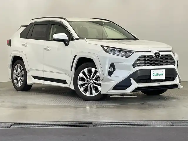 トヨタ ＲＡＶ４ G Zパッケージ 栃木県 2021(令3)年 1.8万km ホワイトパールクリスタルシャイン 純正9インチディスプレイオーディオ/（フルセグTV/Bluetooth/Miracast）/バックカメラ/TRDエアロ/トヨタセーフティセンス/コーナーセンサー/ビルトインETC2.0/パワーバックドア/前席シートヒーター/運転席パワーシート/運転席メモリーシート/ルーフレール/禁煙車/デジタルインナーミラー/ステアリングヒーター/オートライト/LEDヘッドライト/横滑り防止装置/スマートキー/プッシュスタート/ステアリングスイッチ/革巻きステアリング/ウィンカーミラー/純正19インチアルミホイール/純正フロアマット/テレビキャンセラー