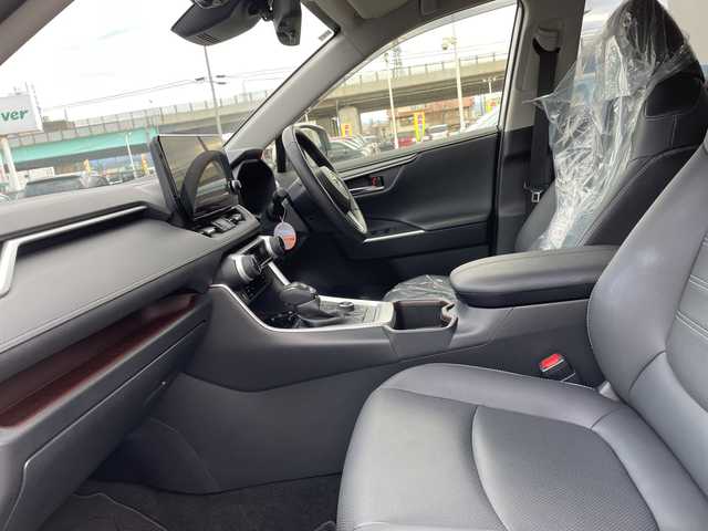 トヨタ ＲＡＶ４ ハイブリッドG 石川県 2024(令6)年 1.8万km パール ４ＷＤ　純正１０．５型ナビ　フルセグＴＶ　全方位カメラ　ＬＥＤヘッドライト　ＴＲＤエアロ　革シート　デジタルミラー　ブラインドスポットモニター　パワーバックドア　純正アルミ　ＥＴＣ２．０　ドラレコ