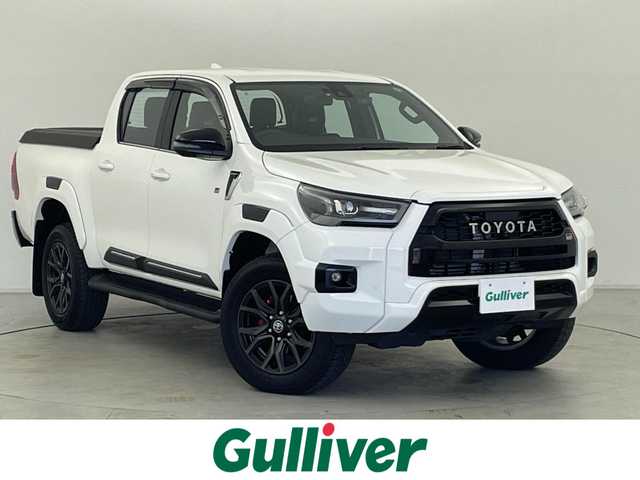 トヨタ ハイラックス Z GRスポーツ 群馬県 2023(令5)年 0.9万km スーパーホワイトⅡ 純正ベッドライナー/純正ハードトノカバー/GRサイドステップ/GR専用ハーフレザー/GRフロアマット/GRドアバイザー/＝＝＝＝＝/純正8インチディスプレイオーディオ/・AM/FM/Bluetooth/apple carplay/andoroid auto/＝＝＝＝＝/純正８インチディスプレイオーディオナビ　パノラミックビューモニター　ＥＴＣ２．０　前後ドラレコ　純正ベッドライナー　純正ハードトノカバー　ＧＲ専用ハーフレザーシート　パワーシート　４ＷＤ　禁煙車