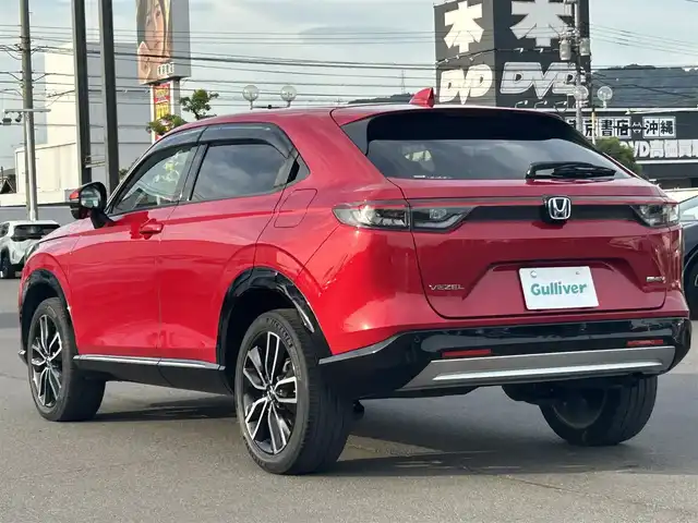 ホンダ ヴェゼル ハイブリッド e:HEV Z 岡山県 2021(令3)年 2.9万km プレミアムクリスタルレッドM 純正ナビ/→AM/FM/Bluetooth/フルセグTV/レーダークルーズコントロール/レーンキープアシスト/ビルトイン2.0ETC/パワーバックドア/全方位カメラ/前後ドライブレコーダー/ハーフレザーシート/シートヒーター/ハンドルヒーター/LEDヘッドライト/コーナーセンサー/置くだけ充電/ブラインドスポットモニター/プッシュスタート/スマートキー/純正18インチアルミホイール