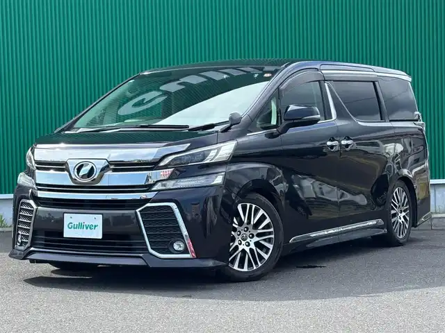 トヨタ ヴェルファイア Z Gエディション 宮城県 2016(平28)年 6.8万km スパークリングブラックパールクリスタルシャイン 応急用タイヤ/＝＝＝/TEIN車高調/クリアランスソナー/バックソナー/純正10インチナビ（NSZN-Z66T）/・CD/DVD/・Bluetooth/・フルセグTV/バックカメラ/ビルトインETC/パワーバックドア/両側パワースライドドア/ハーフレザーシート/パワーシート/ウッドコンビステアリング/ステアリングヒーター/クルーズコントロール/ステアリングスイッチ/電動パーキングブレーキ/ブレーキホールド/LEDヘッドランプ/フォグランプ/オートライト/スマートキー＆プッシュスタート/スペアキー/電動格納ミラー/純正18インチAW/純正フロアマット/純正ドアバイザー/W/サイド/カーテンエアバッグ