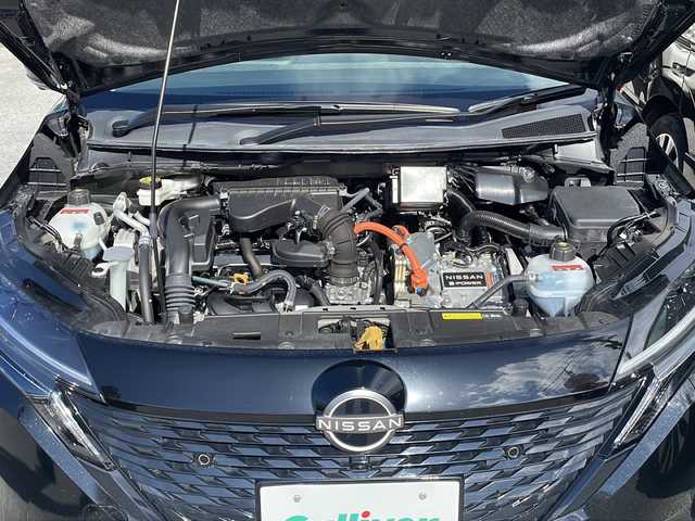 日産 オーラ G レザーエディション 沖縄県 2022(令4)年 3.3万km 黒 純正ディスプレイオーディオ/日産コネクトナビ/フルセグ WIFI Bluetooth　AM FM HDMI USB　APPLECARPLA Androidauto/アラウンドビューモニター/BOSEプレミアムサウンドシステム/インテリジェントルームミラー/ブラインドスポットモニター/プロパイロット/SOSコール/インテリジェントクルーズコントロール/インテリジェントエマージェンシーブレーキ/車線逸脱警報/車線逸脱防止支援/後側方車両検知警報/後側方衝突防止支援/ルート減速支援/後退時車両検知警報/速度標識表示/制限速度支援/標識認識支援/駐車支援/ふらつき警報/クリアランスソナー/ETC2.0/ビークルダイナミクスコントロール/オートハイビーム/革巻きステアリング/ステアリングヒーター/革シート/前席シートヒーター/電子パーキング/置くだけ充電/D-MODE/プッシュスタート/LEDヘッドランプ/オートライト/フォグランプ/純正17インチアルミホイール/電格ウインカーミラー/取説　メンテナンスノート/スペアキー/オートホールド