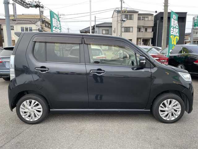 スズキ ワゴンＲ スティングレー X 石川県 2014(平26)年 7.4万km 黒 4WD/社外メモリーナビ/ワンセグTV/HIDヘッドライト/ETC/スマートキー/プッシュスタート/電動ミラー/レーダーブレーキ/Wエアバッグ