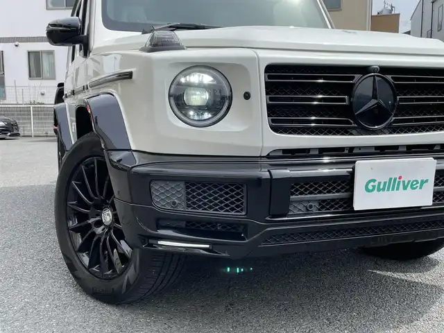 メルセデス・ベンツ ゲレンデヴァーゲン Ｇ４００ｄ マヌファクトゥーアエディション 神奈川県 2021(令3)年 1.6万km ダイヤモンドホワイト マヌファクトゥーアエディション/左右電動サイドステップ/ブラバスフロントスポイラー/ワンオーナー/AMGライン/ラグジュアリーパッケージ/レーダーセーフティパッケージ/アダプティブダンピング/サンルーフ/白革シート/ブルメスターサウンド/純正メモリーナビ・地デジTV/全方位カメラ/デジタルインナーミラー/純正USB/BT再生/ETC2.0/前席パワーシート/マッサージ機能付き/シートヒーター/エアシート/純正20インチAW/LEDヘッドライト/レーダークルーズコントロール/衝突軽減ブレーキ/LKA/BSM/標識検知/コーナーセンサー/パドルシフト/プッシュスタート/キーレスキー×2/R3/4/5/6年ディーラー整備記録/保証書・取説あり