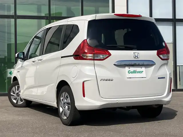 ホンダ フリード ハイブリット G ホンダセンシング 道南・函館 2022(令4)年 7.9万km プラチナホワイトパール 純正ナビ/フルセグＴＶ/衝突軽減ブレーキ/夏冬タイヤ/寒冷地/ＥＴＣ/クルーズコントロール/バックカメラ/コーナーセンサー/両側パワースライドドア/オートライト/車線逸脱警報装置/純正アルミホイール