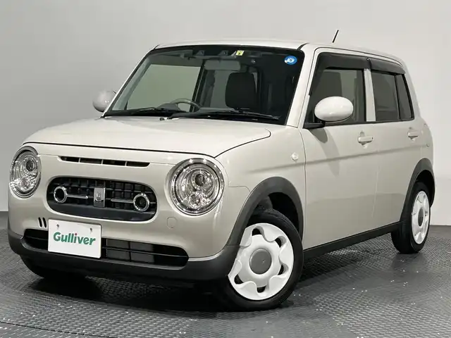 スズキ ラパン ＬＣ X 愛媛県 2022(令4)年 1.3万km フォーンベージュM ・ナビ（ワンセグＴＶ・ＢＴ・ＳＤ・ＣＤ・ＤＶＤ・ＦＭ・ＡＭ）/・前後ドラレコ　/・Ｄ席シートヒーター　/・衝突軽減ブレーキ　/・レーンキープアシスト　/・ＵＳＢ充電