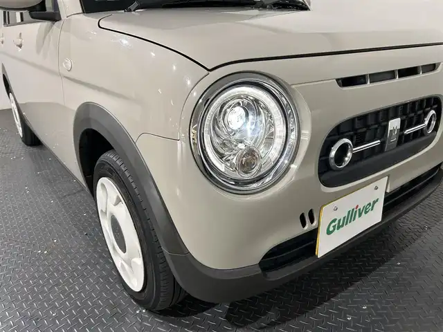 スズキ ラパン ＬＣ X 愛媛県 2022(令4)年 1.3万km フォーンベージュM ・ナビ（ワンセグＴＶ・ＢＴ・ＳＤ・ＣＤ・ＤＶＤ・ＦＭ・ＡＭ）/・前後ドラレコ　/・Ｄ席シートヒーター　/・衝突軽減ブレーキ　/・レーンキープアシスト　/・ＵＳＢ充電