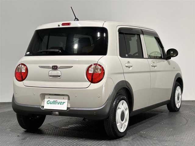 スズキ ラパン ＬＣ L 愛媛県 2022(令4)年 1.3万km フォーンベージュM ・ナビ（ワンセグＴＶ・ＢＴ・ＳＤ・ＣＤ・ＤＶＤ・ＦＭ・ＡＭ）/・前後ドラレコ　/・Ｄ席シートヒーター　/・衝突軽減ブレーキ　/・レーンキープアシスト　/・ＵＳＢ充電